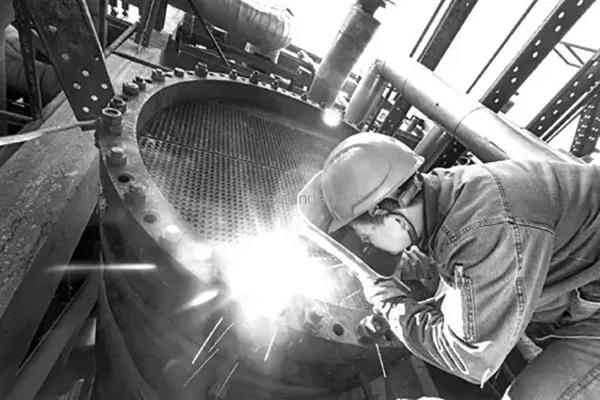 Manufacture of double tube plate heat exchanger